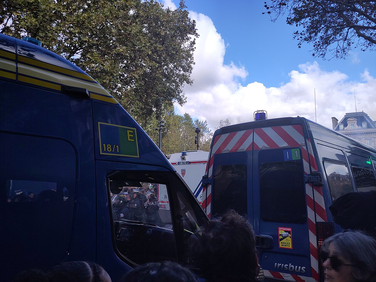 Police vans, 17 October demonstration in Paris